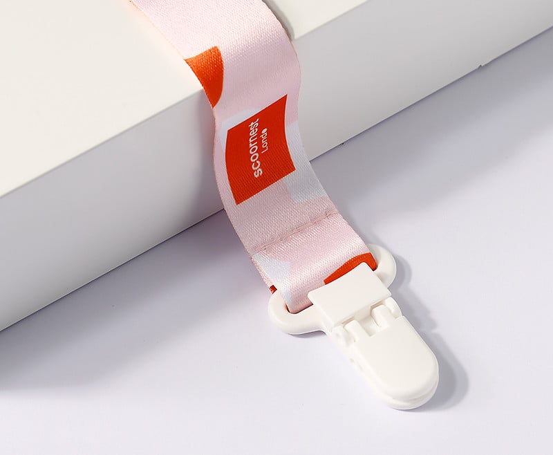 Attache-tétine chaîne avec anneau de dentition