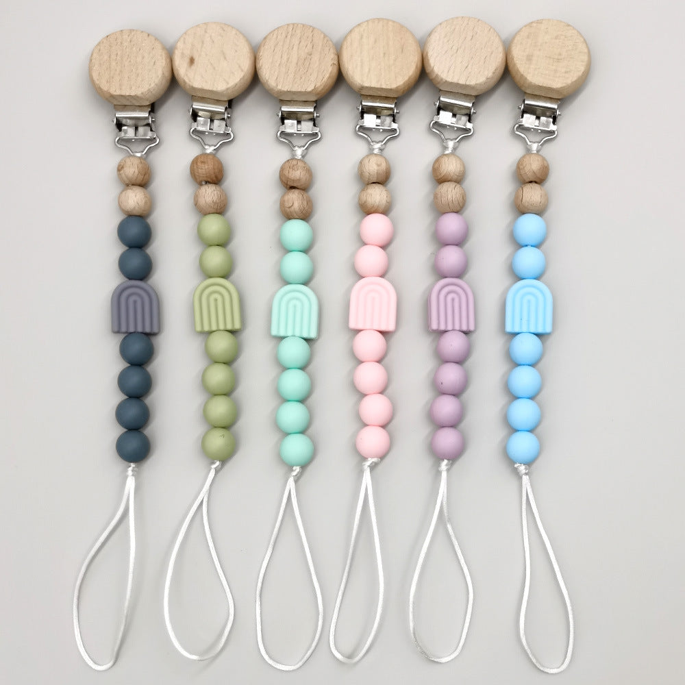 Attache-tétine arc-en-ciel perles bois et silicone