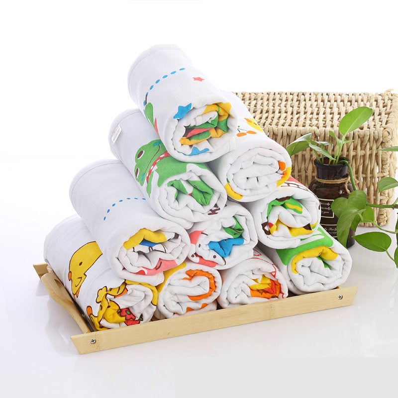 Serviette de bain bébé double gaze motifs enfantins