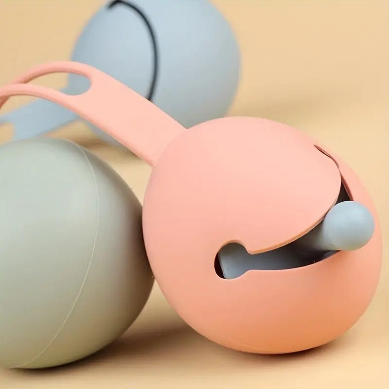 Boîte range-tétine en silicone avec attache
