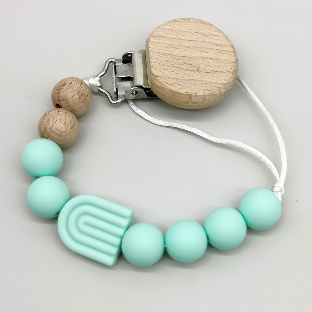 Attache-tétine arc-en-ciel perles bois et silicone