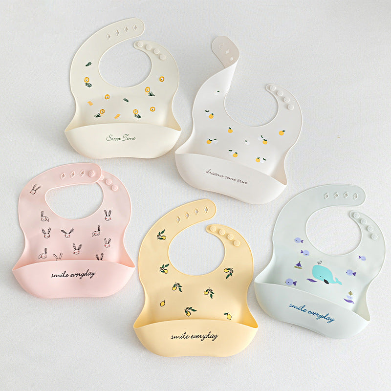 Bavoir silicone imperméable avec poche ramasse-miettes