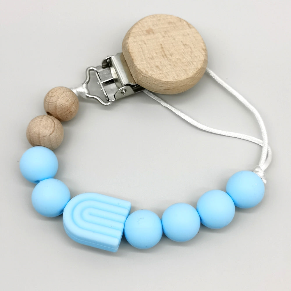 Attache-tétine arc-en-ciel perles bois et silicone