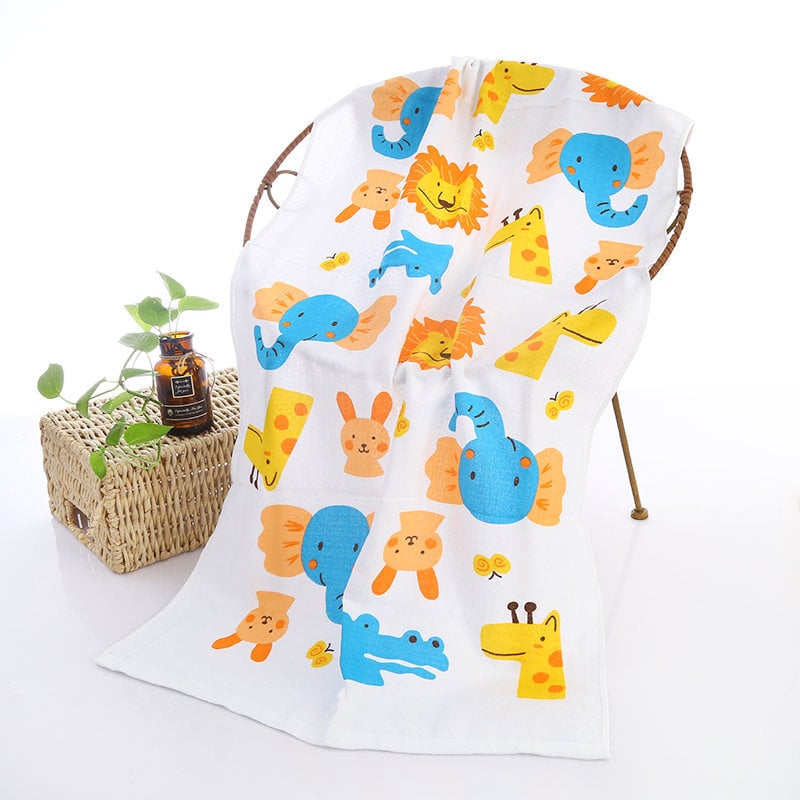 Serviette de bain bébé double gaze motifs enfantins