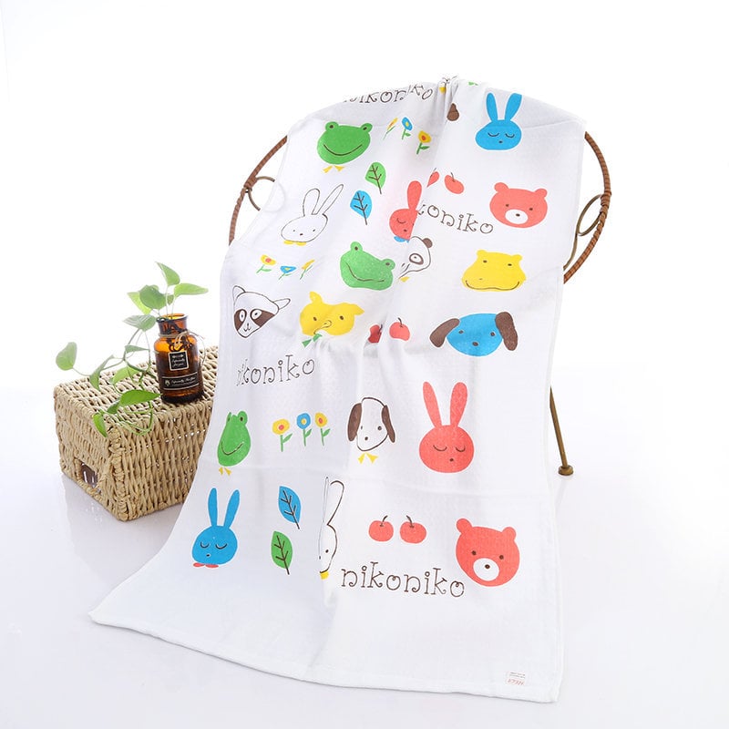 Serviette de bain bébé double gaze motifs enfantins