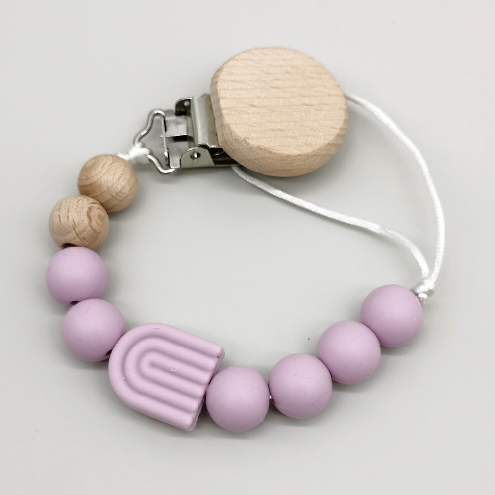 Attache-tétine arc-en-ciel perles bois et silicone