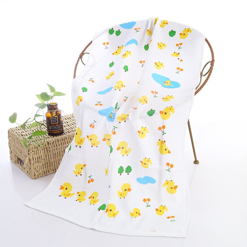 Serviette de bain bébé double gaze motifs enfantins