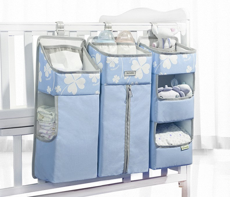 Organiseur suspendu de rangement pour couches