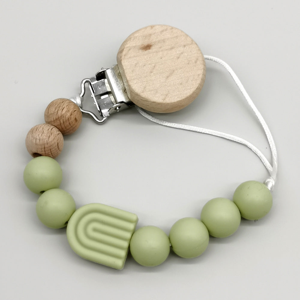 Attache-tétine arc-en-ciel perles bois et silicone